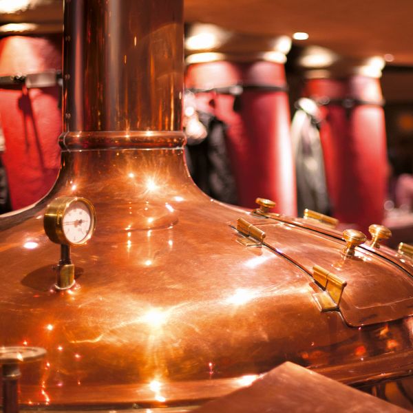 Darstellung eines Gärtanks in einer Brauerei. Die Geräte sind mit ELKALUB H1-Schmierstoffen behandelt.