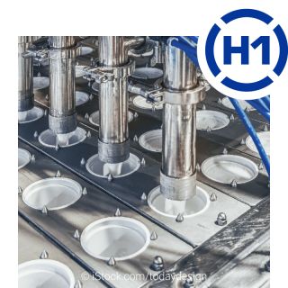 Darstellung einer mit ELKALUB H1-Schmierstoffen geschmierten Joghurtabfüllanlage.